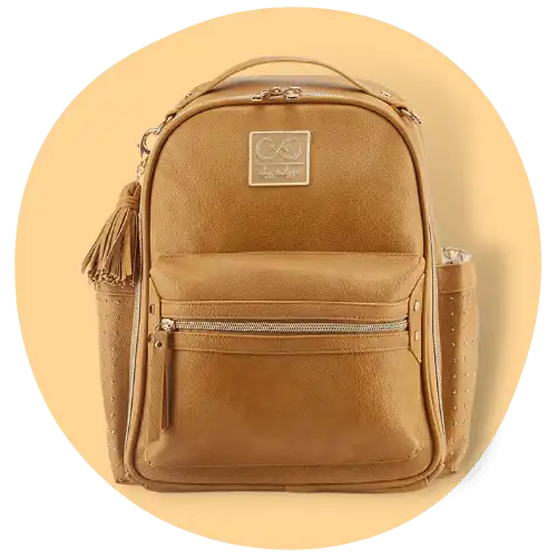 Itzy Ritzy Chelsea And Cole Caramel vegan leather mini diaper bag backpack